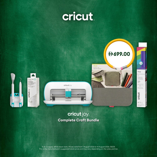 Cricut Joy complete craft bundle featuring a white and teal Cricut cutting machine, a gray tablet sleeve, a box of Cricut pens, and two Cricut tools, displayed on a dark green chalkboard-style background with the Cricut logo and a $699.00 price badge.