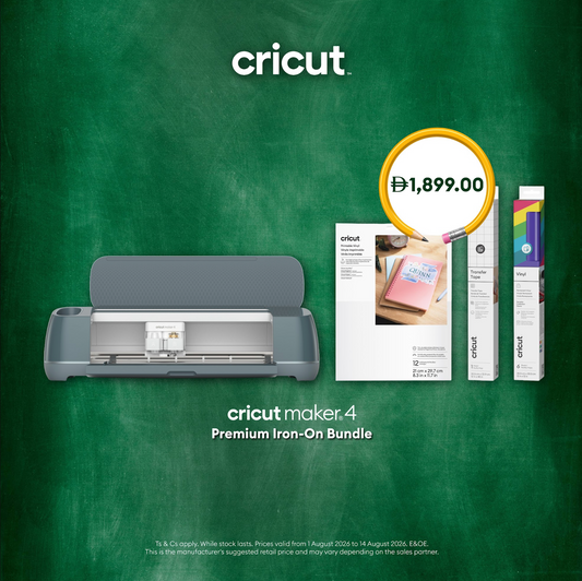Cricut Maker 4 Premium Iron-On Bundle featuring a gray Cricut machine, a white Cricut iron-on kit box, and two Cricut iron-on cartridges, displayed against a green chalkboard-style background with the Cricut logo and a price badge.